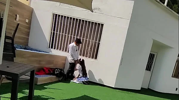 Young schoolboys have sex on the school terrace and are caught on a security camera.