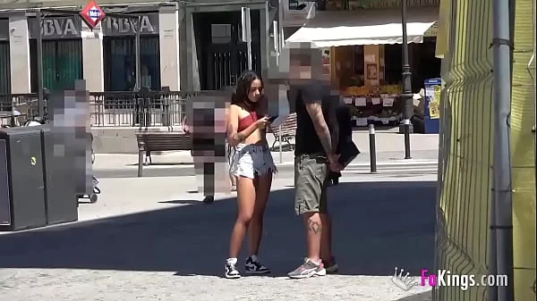 Young 'n shy babe seduces random guys in the streets of Madrid!